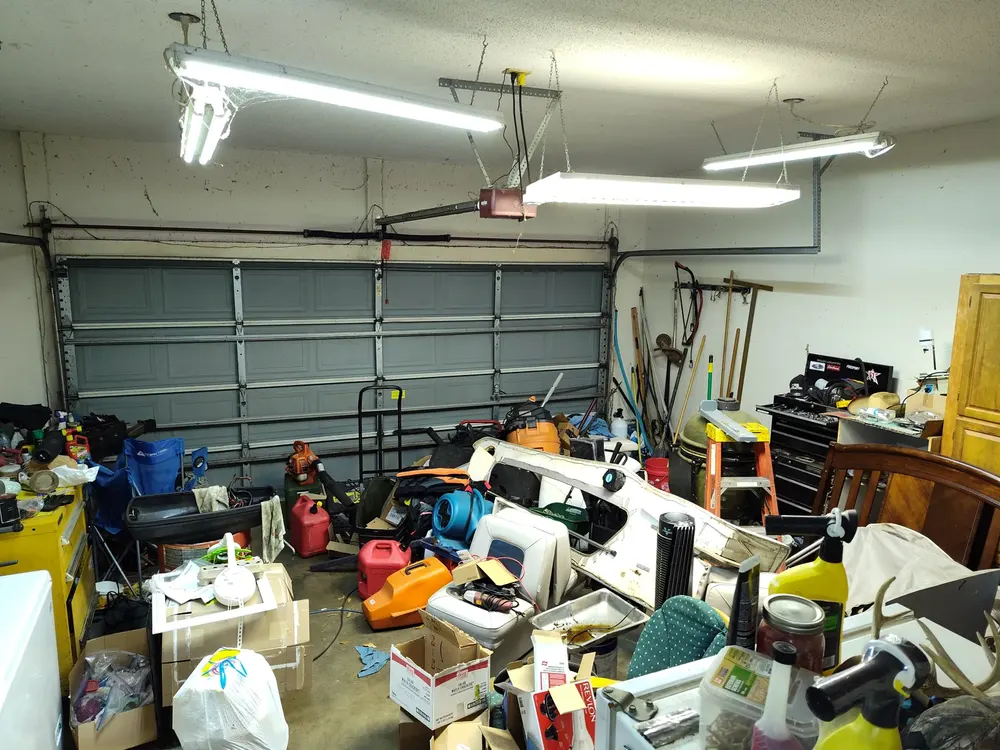 A garage full of belongings in a Georgia house we bought as-is